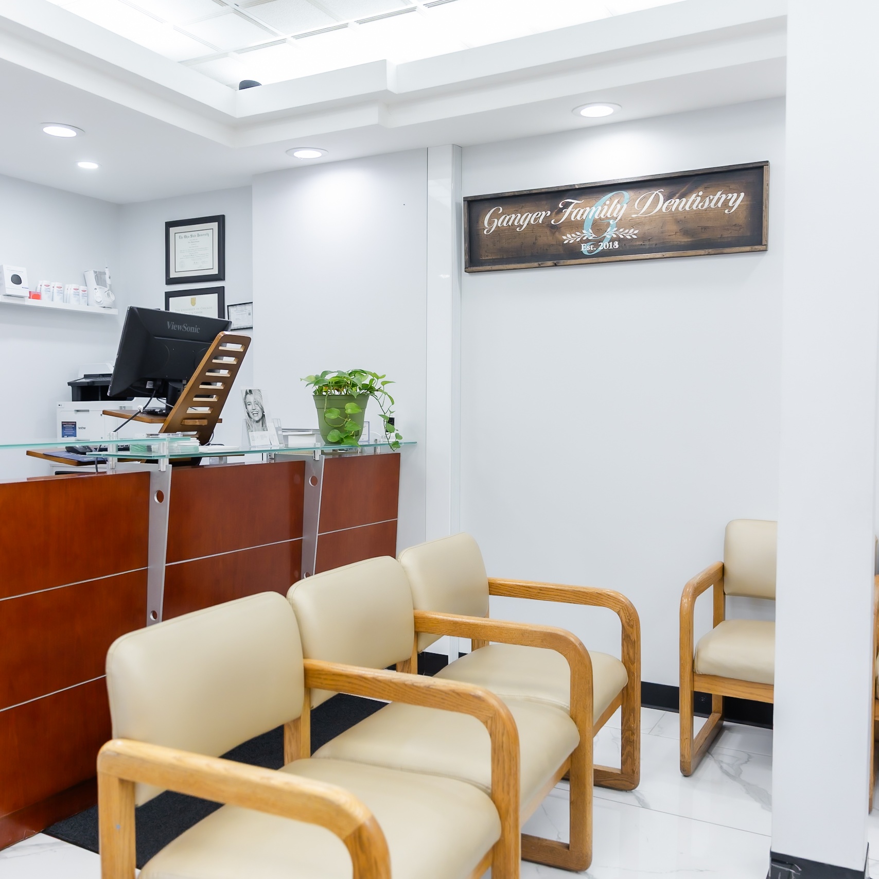 Reception area at Ganger Family Dentistry — comfortable seating and welcoming front desk in McKinley Park, Chicago